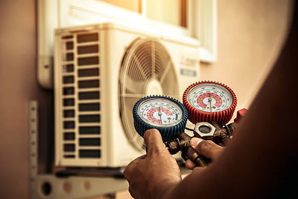 Professional Heat Pump Repair technician working in Plattsburg, MO